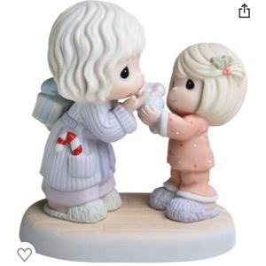“The gift is in the giving” Precious Moments figurine